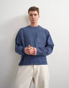 Model wearing Relaxed fit long sleeve heavyweight t-shirt in washed navy