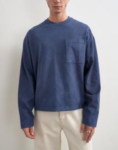 Model wearing Relaxed fit long sleeve heavyweight t-shirt in washed navy