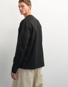 Model wearing Relaxed fit long sleeve t-shirt in black