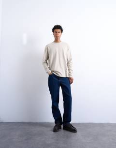 Model wearing Relaxed fit long sleeve t shirt in stone