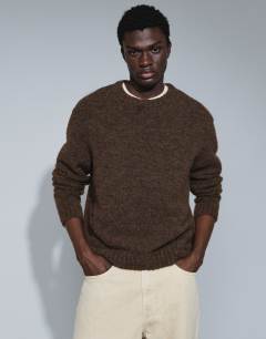 Model wearing Relaxed fit loose knit jumper in brown