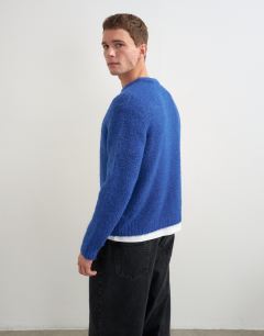 Model wearing Relaxed fit loose knit jumper in cobalt blue