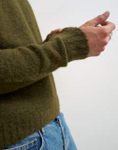 Model wearing Relaxed fit loose knit jumper in khaki