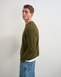 Model wearing Relaxed fit loose knit jumper in khaki