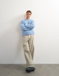 Model wearing Relaxed fit loose knit jumper in light blue