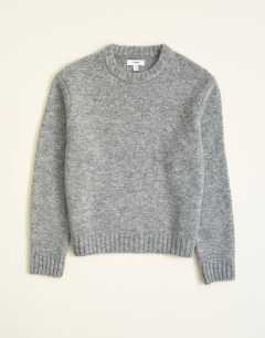 Model wearing Relaxed fit loose knit jumper in light grey