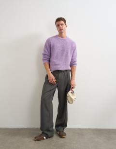 Model wearing Relaxed fit loose knit jumper in lilac