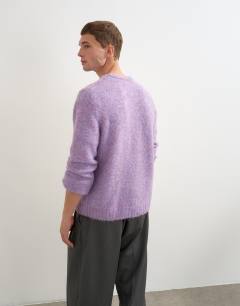 Model wearing Relaxed fit loose knit jumper in lilac