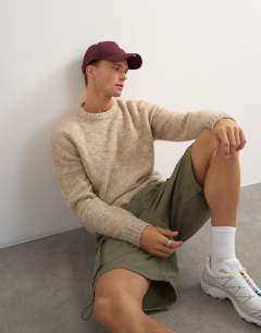 Model wearing Relaxed fit loose knit jumper in stone