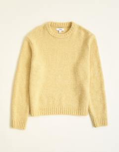 Model wearing Relaxed fit loose knit jumper in yellow