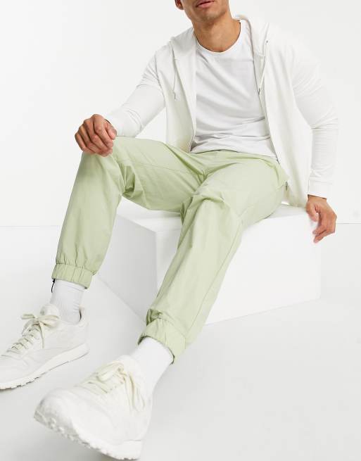 Topman relaxed fit nylon jogger trousers in sage