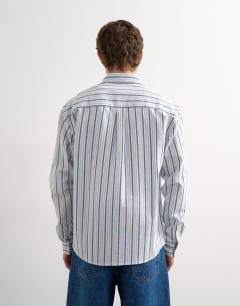 Model wearing Relaxed fit oxford shirt with stripe in blue