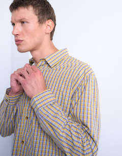 Model wearing Relaxed fit poplin check shirt in mustard