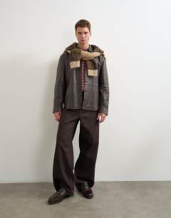 Model wearing Relaxed fit real leather overshirt in chocolate brown