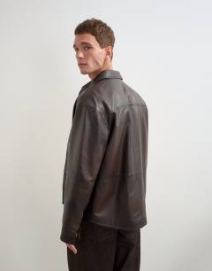 Model wearing Relaxed fit real leather overshirt in chocolate brown