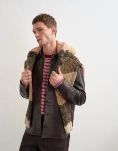Model wearing Relaxed fit real leather overshirt in chocolate brown