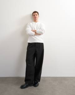 Model wearing Relaxed fit rib henley in ecru