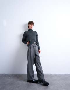 Model wearing Relaxed fit roll neck long sleeve t-shirt in dark grey 