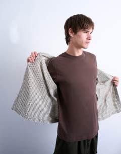 Model wearing Relaxed fit short sleeve textured check shirt in stone