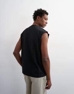 Model wearing Relaxed fit sleeveless t-shirt in black