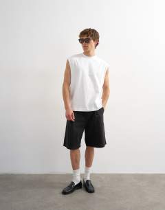 Model wearing Relaxed fit sleeveless t-shirt in white