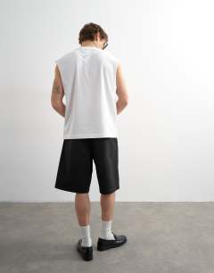 Model wearing Relaxed fit sleeveless t-shirt in white