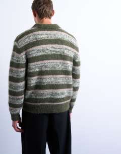 Model wearing Relaxed fit stripe knitted polo in khaki