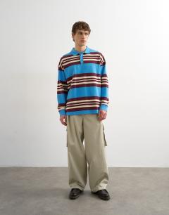 Model wearing Relaxed fit stripe polo in blue