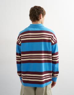 Model wearing Relaxed fit stripe polo in blue