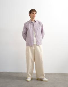 Model wearing Relaxed fit stripe shirt in purple