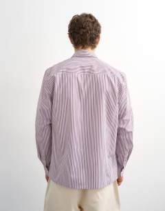 Model wearing Relaxed fit stripe shirt in purple