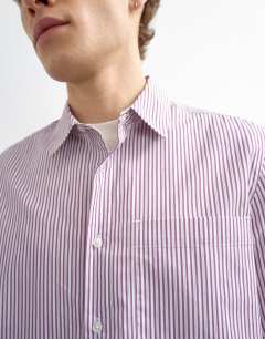 Model wearing Relaxed fit stripe shirt in purple