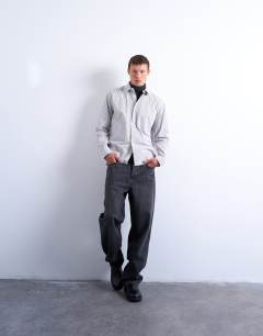 Model wearing Relaxed fit stripe shirt in tonal ecru & brown