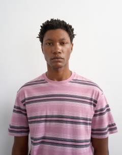 Model wearing Relaxed fit striped t-shirt in pink