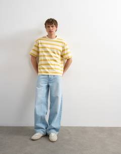 Model wearing Relaxed fit striped t-shirt in yellow