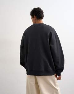 Model wearing Relaxed fit sweatshirt with chenille Pittsburgh in black