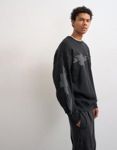 Relaxed fit sweatshirt with digital floral front and back print in washed black