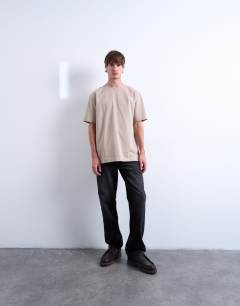 Model wearing Relaxed fit t-shirt in beige 