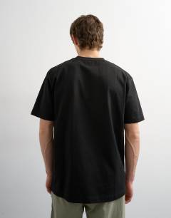 Model wearing Relaxed fit t-shirt in black