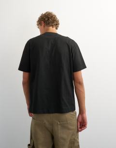 Model wearing Relaxed fit t-shirt in black