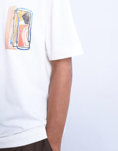 Model wearing Relaxed fit t-shirt with abstract block print in ecru