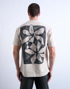 Model wearing Relaxed fit t-shirt with front and back floral print in stone 