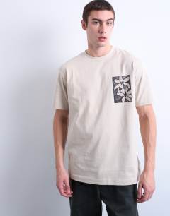 Model wearing Relaxed fit t-shirt with front and back floral print in stone 