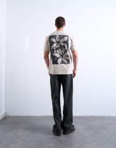 Model wearing Relaxed fit t-shirt with front and back floral print in stone 