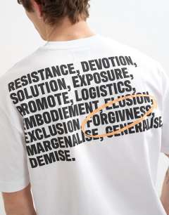 Model wearing Relaxed fit t-shirt with front and back forgiveness print in black