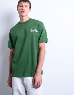Model wearing Relaxed fit t-shirt with front and back lucky print in washed green