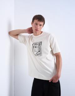 Model wearing Relaxed fit t-shirt with front and back Mothers Keeper print in ecru