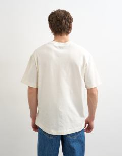 Model wearing Relaxed fit t-shirt with Manhattan embroidery in ecru
