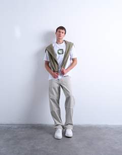 Model wearing Relaxed fit t-shirt with sun doodle print and embroidery in white