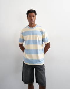 Model wearing Relaxed fit t-shirt with wide stripe in blue and cream 